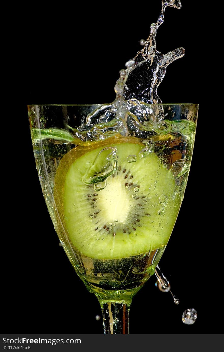 Kiwi in sparks of water