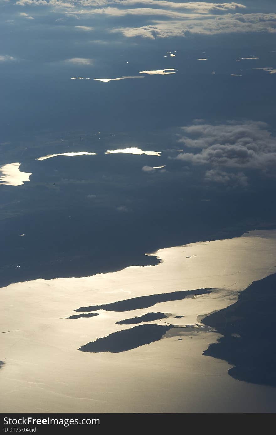 Aerial photo of coastal landscape during sunset