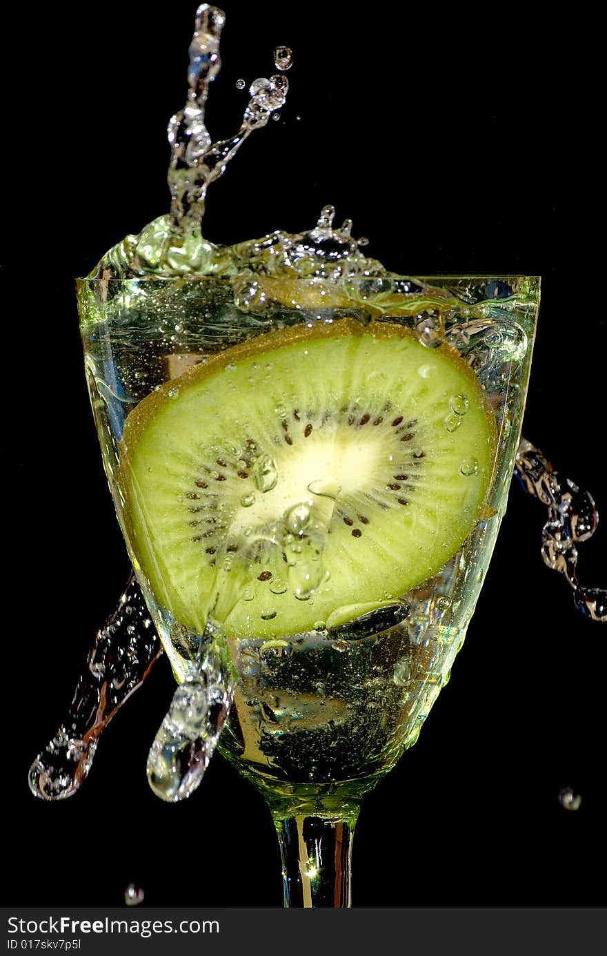 Kiwi in sparks of water