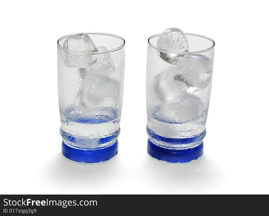 Some ice cubes before melting in a glass