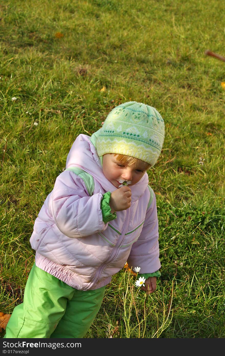 Girl smells the flower