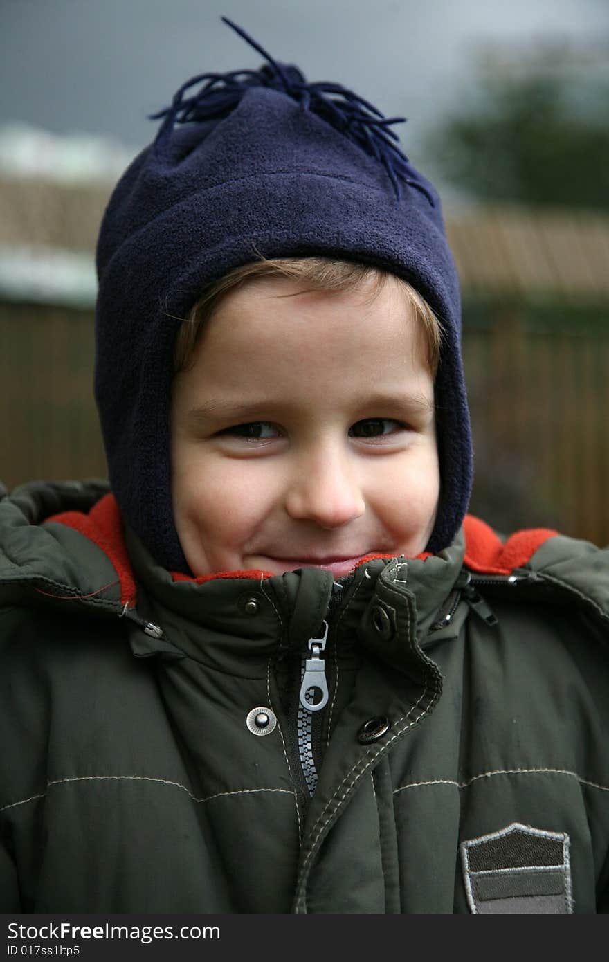 The five years' boy with a cheerful sly look in the autumn. The five years' boy with a cheerful sly look in the autumn