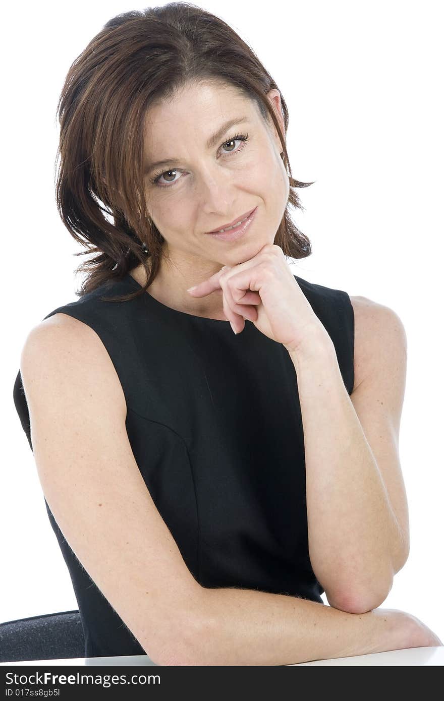 Portrait on white background of a forty years old woman in studio. Portrait on white background of a forty years old woman in studio