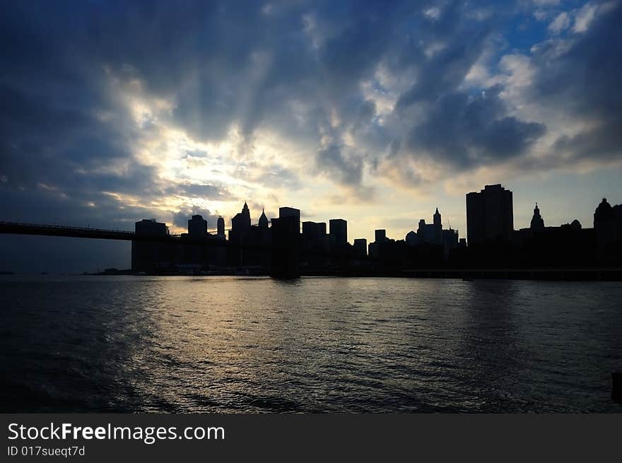 Silhouette of downtown Manhattan during Sunset. Silhouette of downtown Manhattan during Sunset