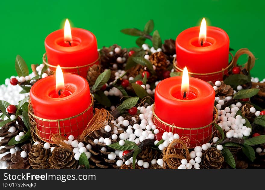 Christmas candles arrangement in colorful festive themes