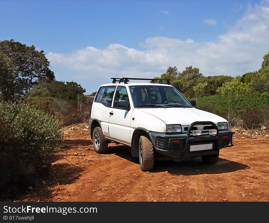 White 4x4 vehicle in the countryside