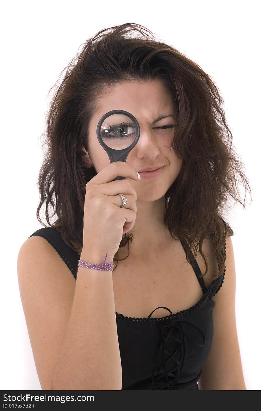 Girl looking at cam with magnifier