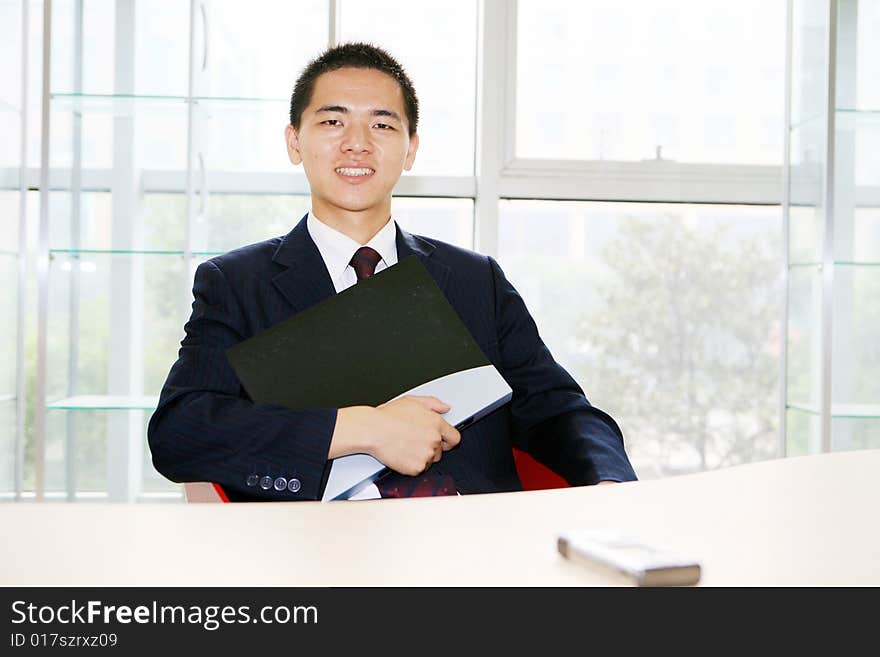 Young asian working in office