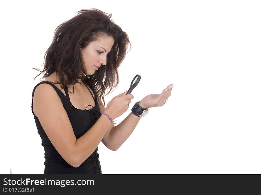 Young girl with magnifier in hand. Young girl with magnifier in hand