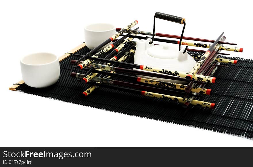 Chopsticks, tea pot and cups