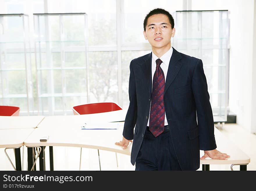 A young asian working in office