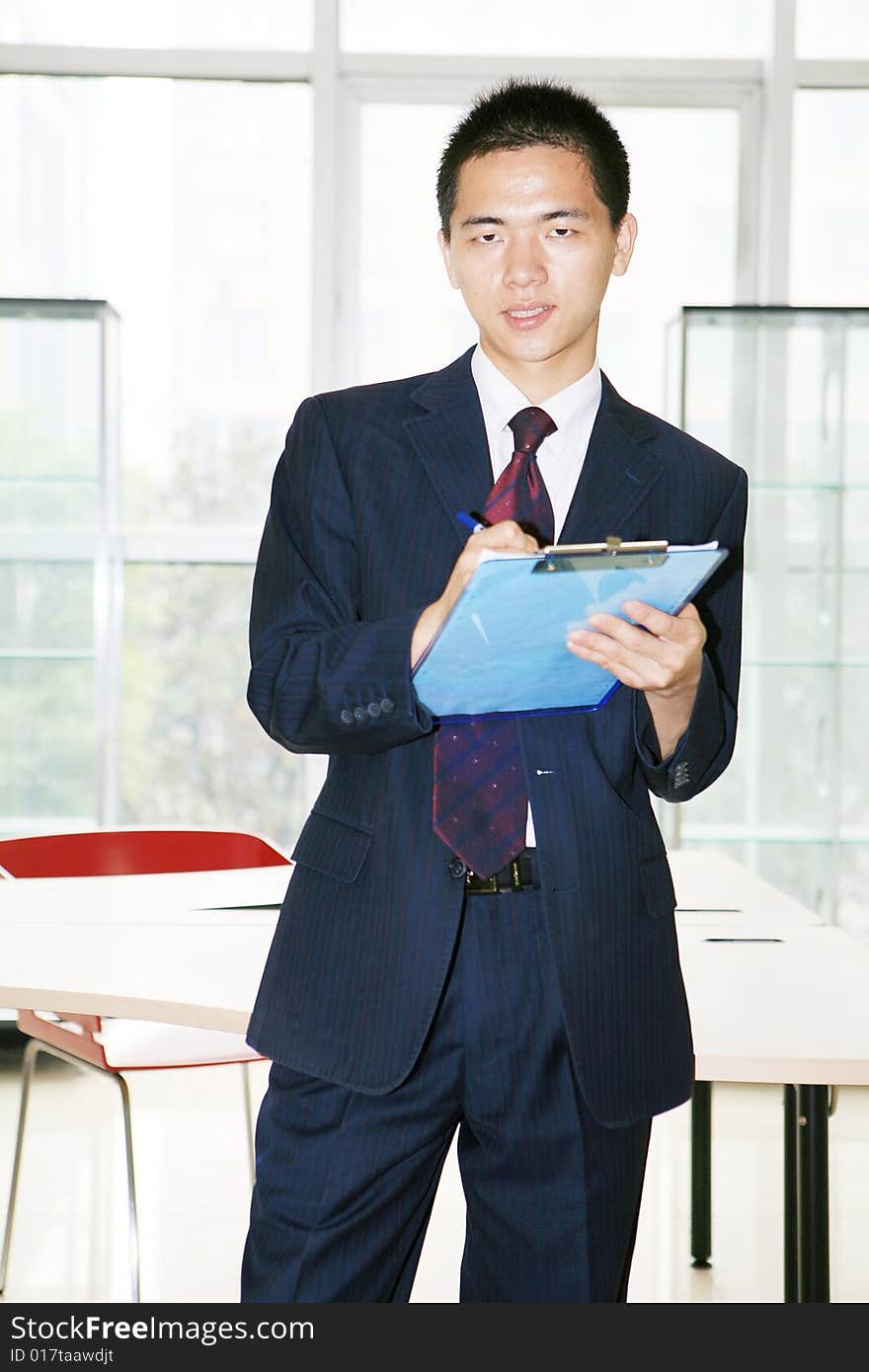 Young asian working in office