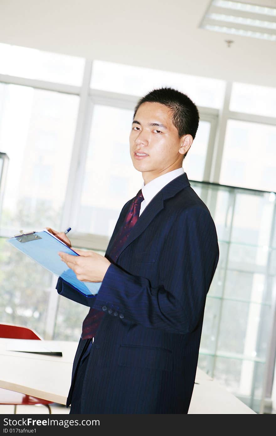 Young asian working in office