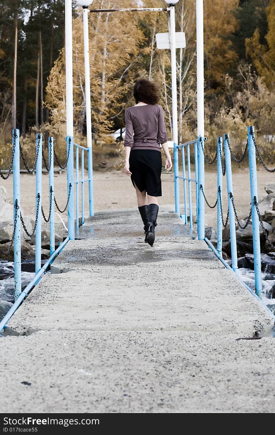 Girl on landing stage