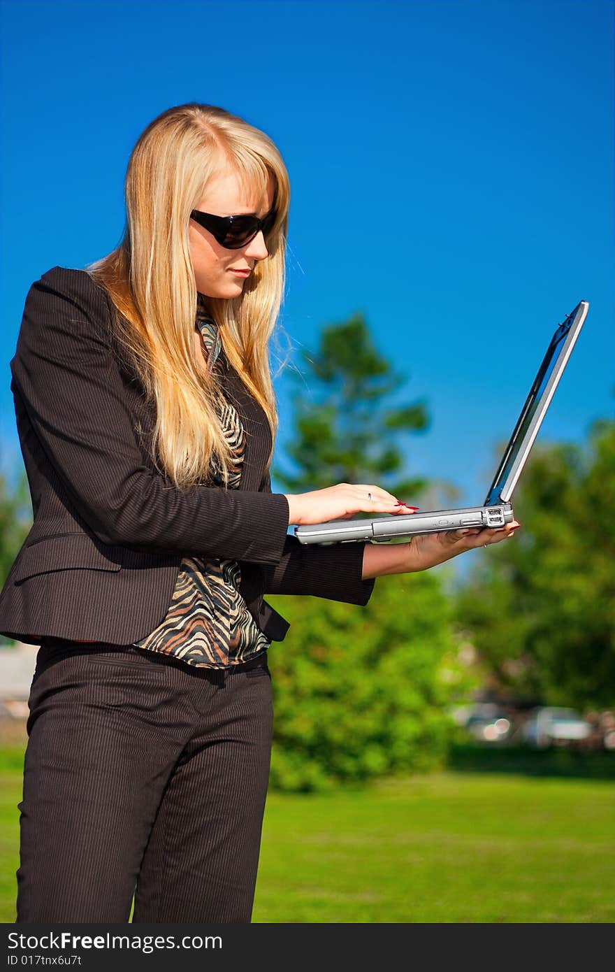 Businesswoman working on laptop