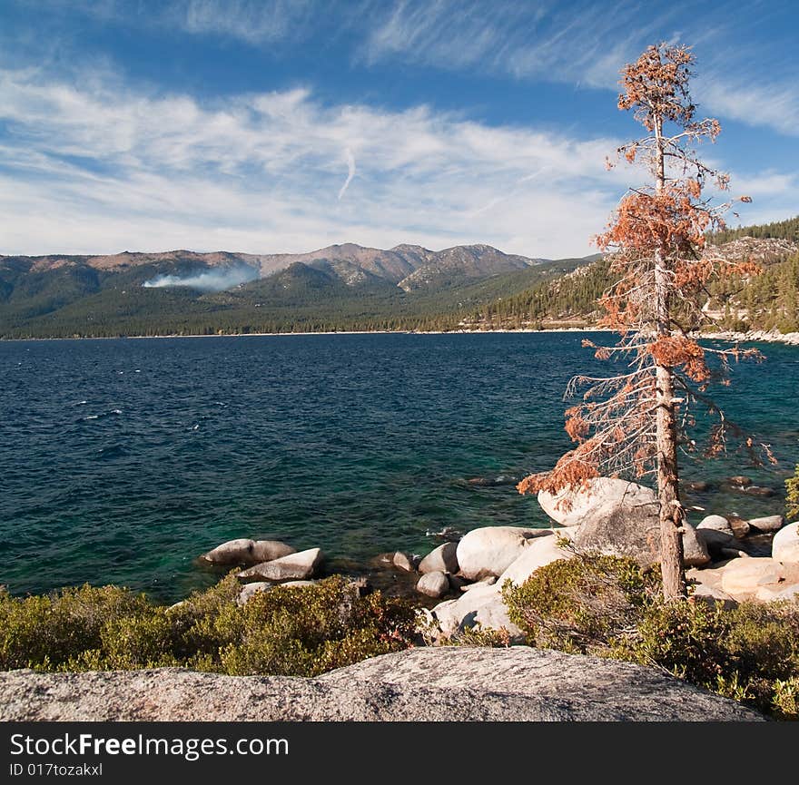 Clear sky and good view of the water, with mountains in the background. Clear sky and good view of the water, with mountains in the background.