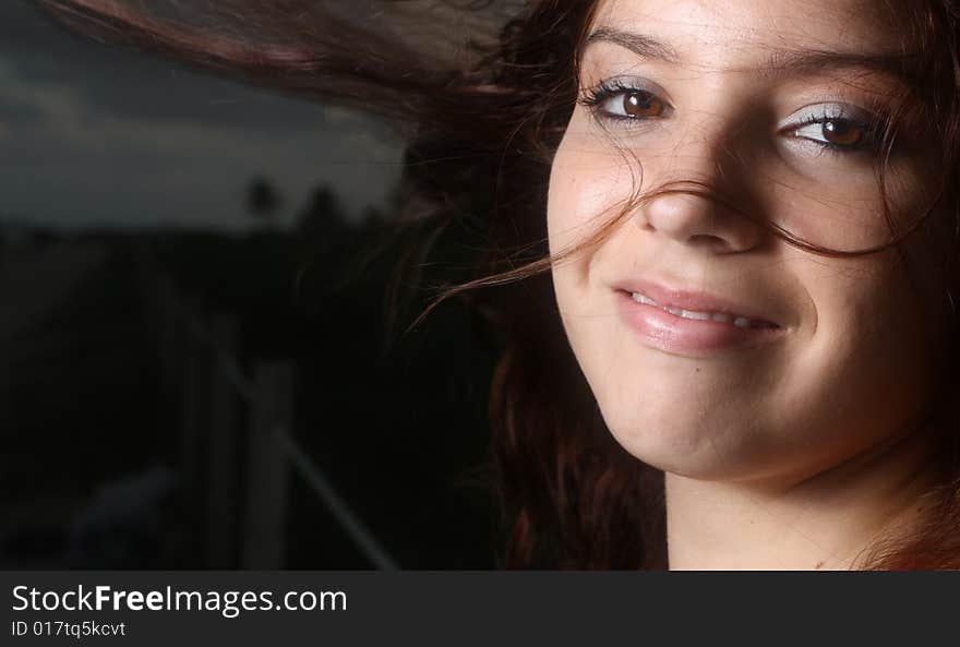 Woman smiling in windy weather