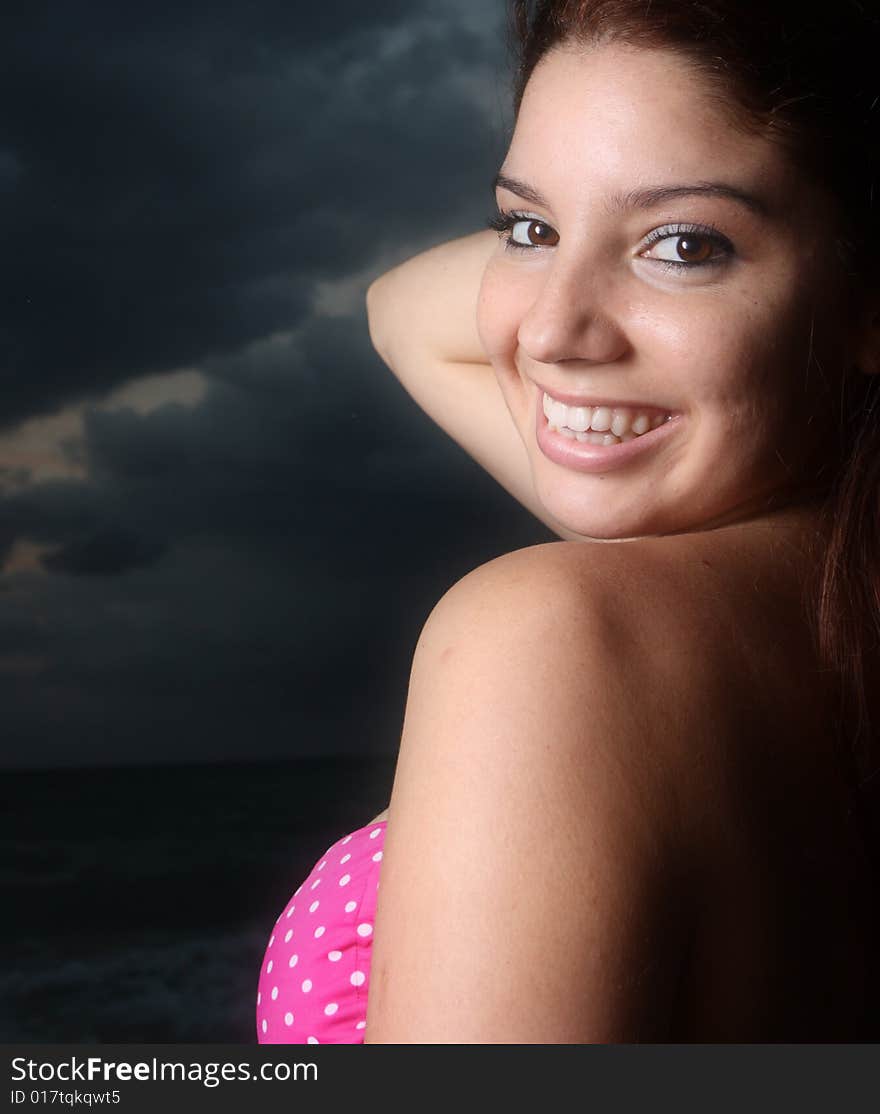 Young female posing in a pink bikini. Young female posing in a pink bikini