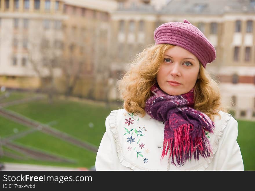 Middle age woman portrait in a city