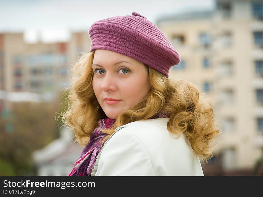 Middle age woman portrait in a city