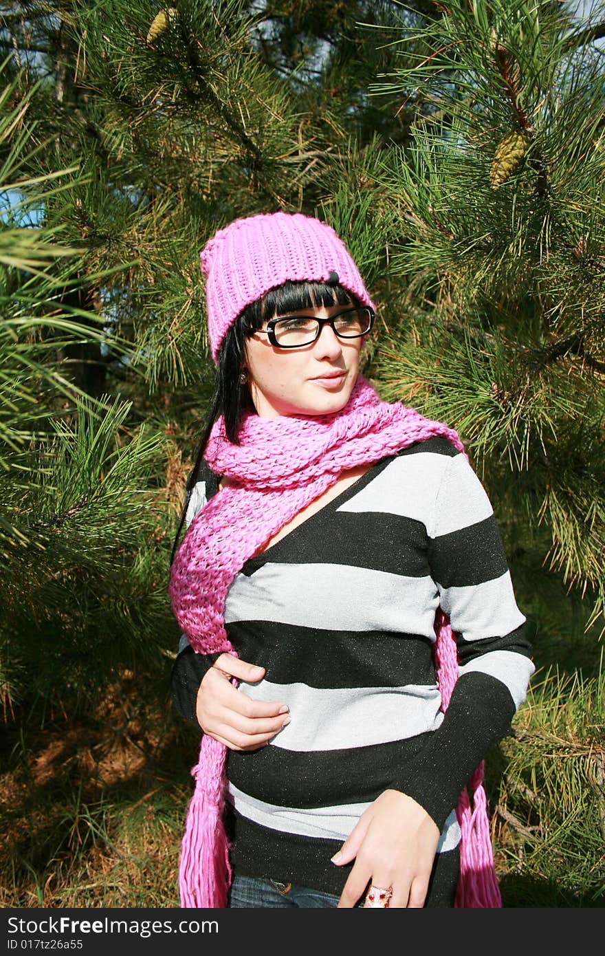 Young beautiful woman in a red cap