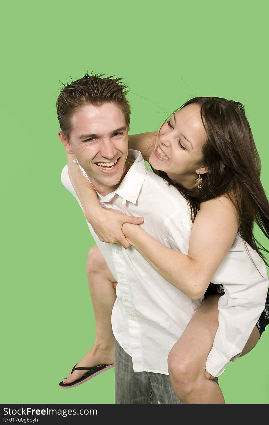 Happy couple close up smiling over green screen