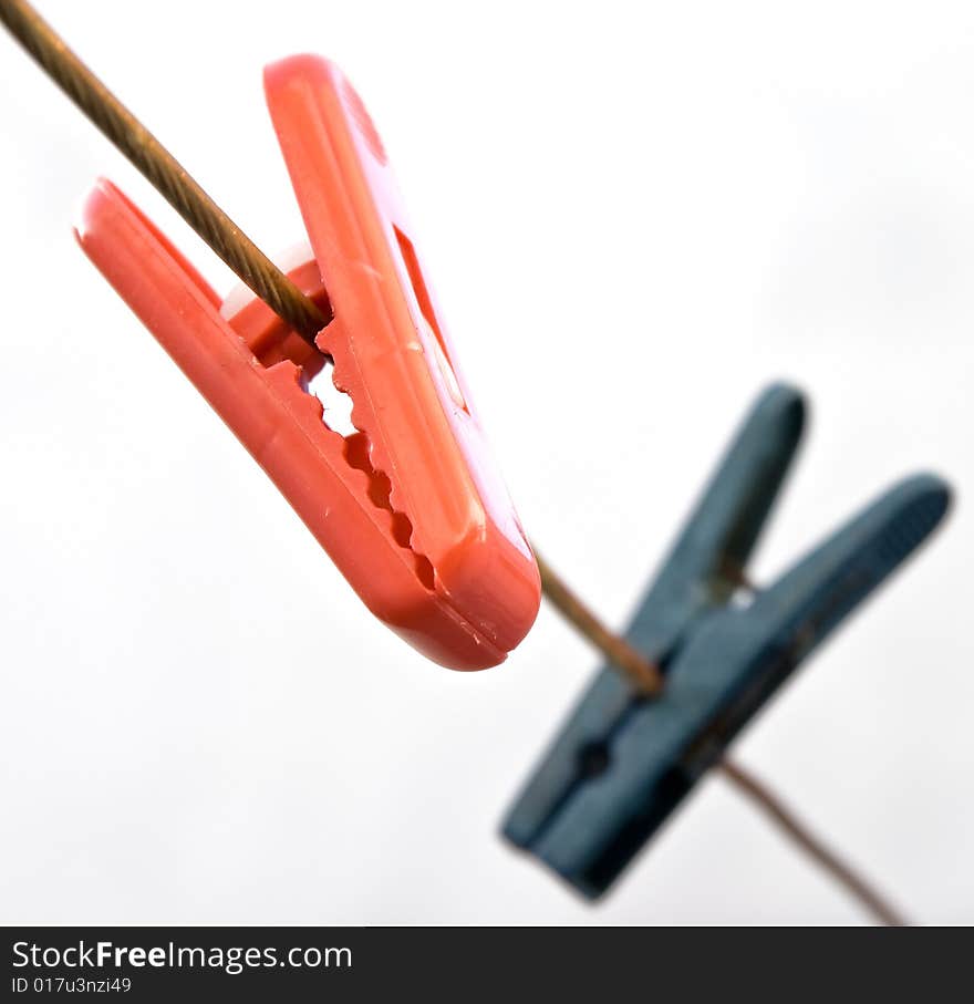 Blue and Red Plastic Clothes Pins.