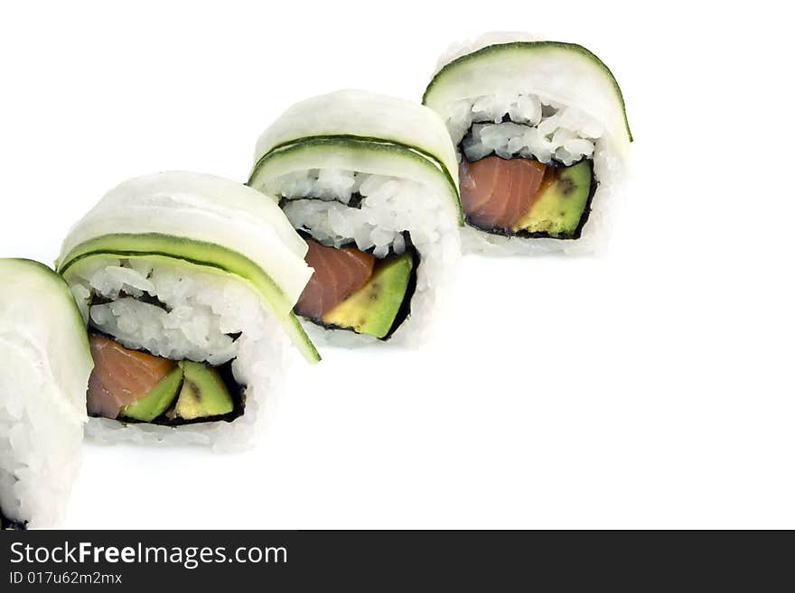 Sushi rolls with avocado, salmon, cucumber are isolated on white background