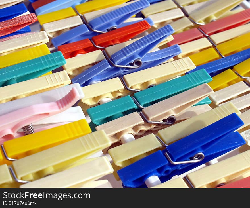 Coloured laundry clips back ground