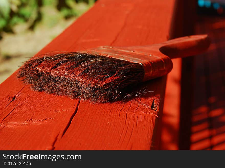 Brushes With Red Paint