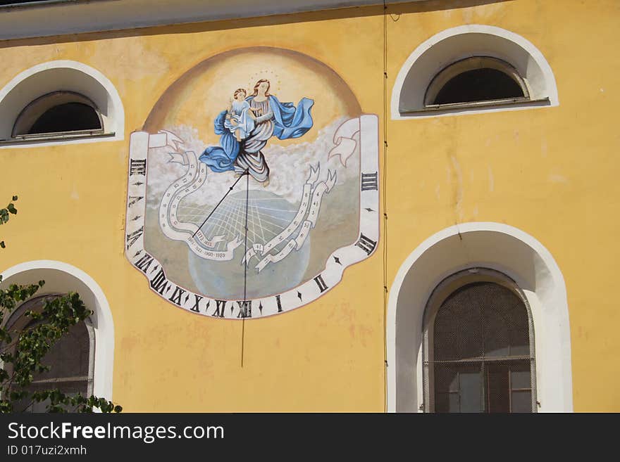 Sundial on the wall of a church