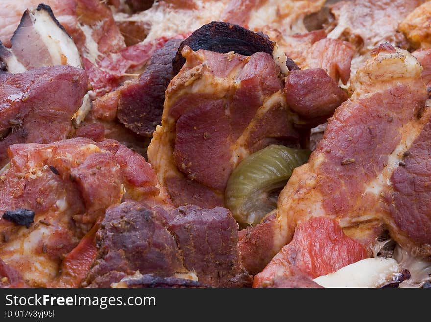 Barbecued pork meat with peppers