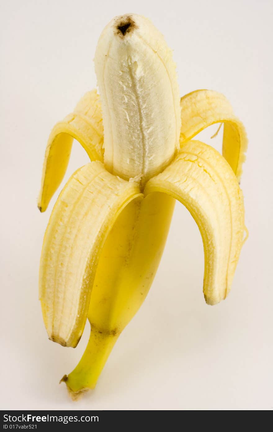 Ona cleared banana isolated on white background. Ona cleared banana isolated on white background