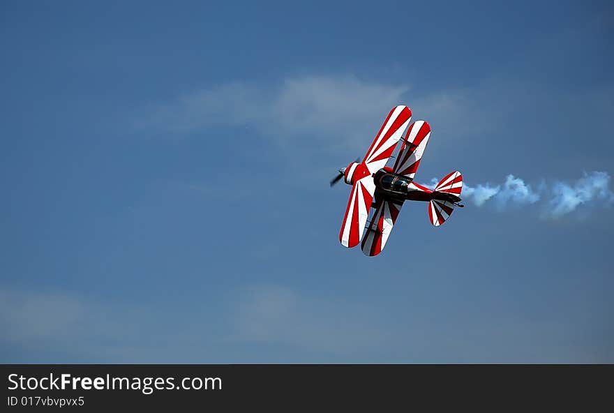 Acrobatic airplane in the sky