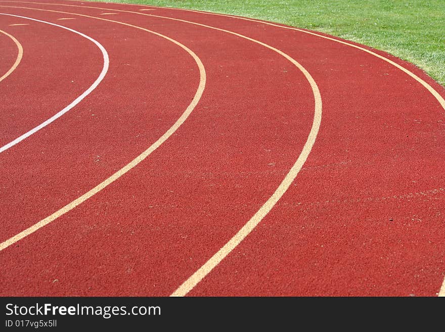 Red running track lanes image