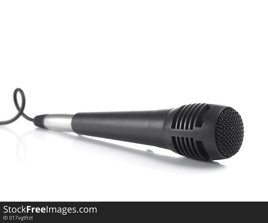 A black microphone isolated on white background.