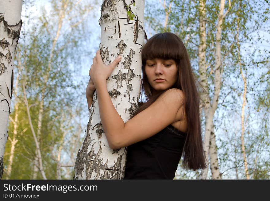 Beauty young girl hugging the birch. Beauty young girl hugging the birch