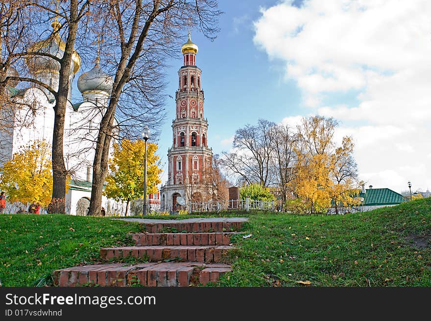 In the foreground a ladder which conducts to a belltower, on the right church. In the foreground a ladder which conducts to a belltower, on the right church