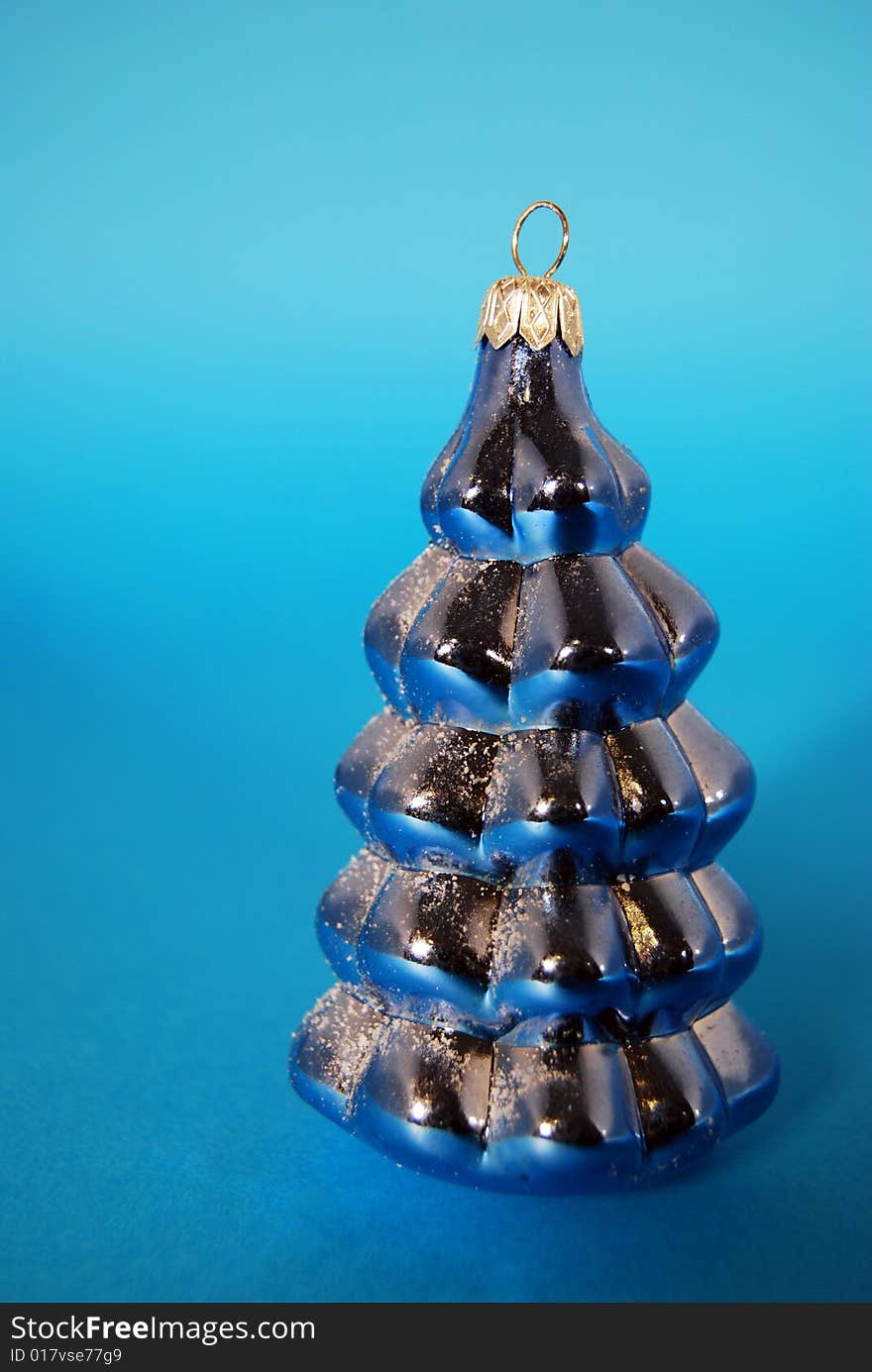 A christmas decoration with a blue tree