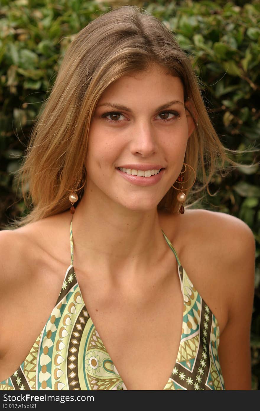 Young Woman Wearing A Green Dress