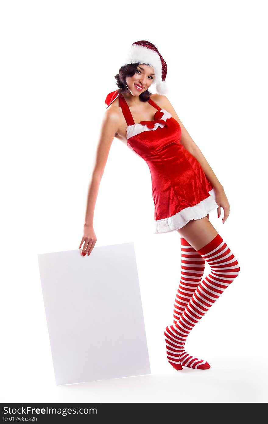 Smiling christmas woman isolated on white background with a white paper