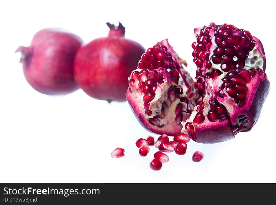 Fresh pomegranate, isolated on white background