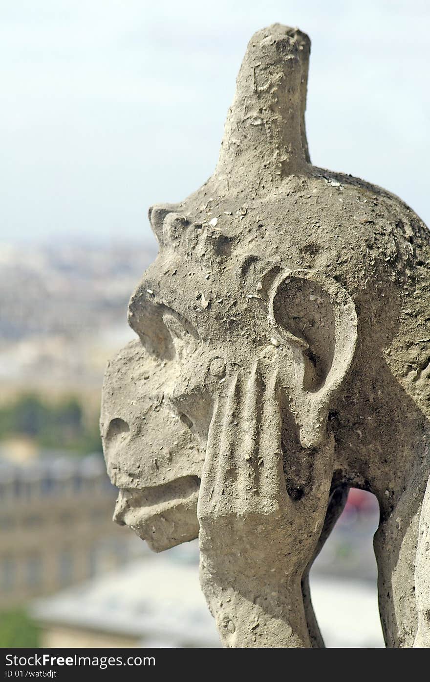 Closeup of gargoyle on top of notre dame, Paris. Closeup of gargoyle on top of notre dame, Paris