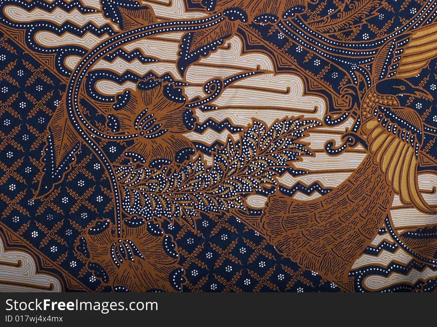 A detail of a tradional shirt in Indonesia. A detail of a tradional shirt in Indonesia