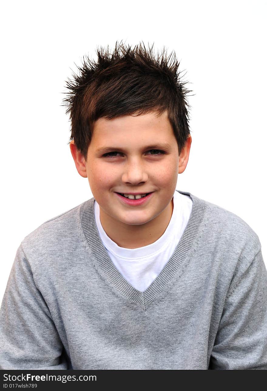 Shot of a teenage boy smiling on white. Shot of a teenage boy smiling on white