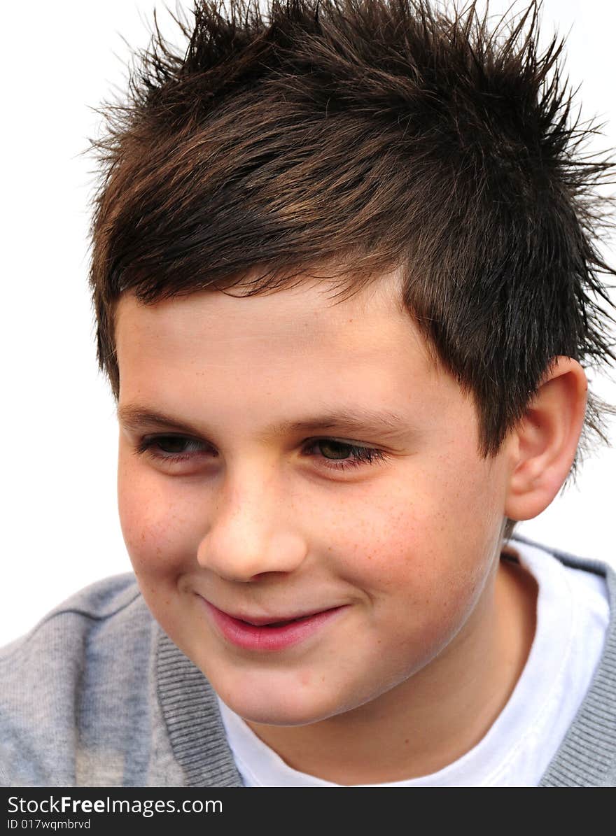 Shot of a teenage boy smiling on white. Shot of a teenage boy smiling on white