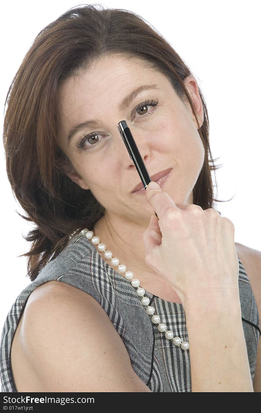 Portrait of happy businesswoman with a pen in hand