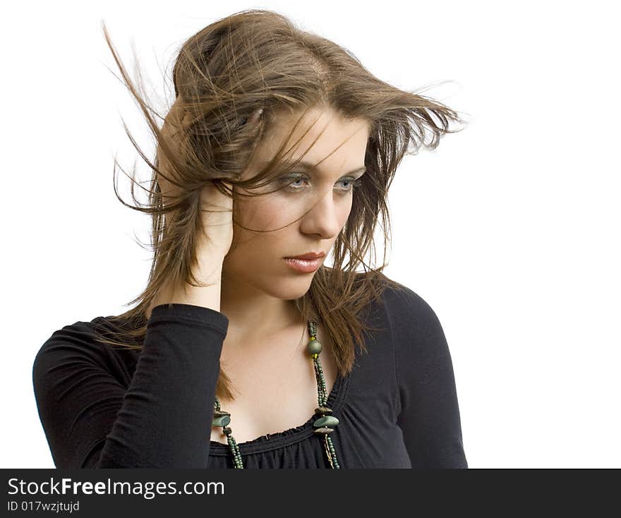 Portrait of an attractive  girl in black on white background. Portrait of an attractive  girl in black on white background