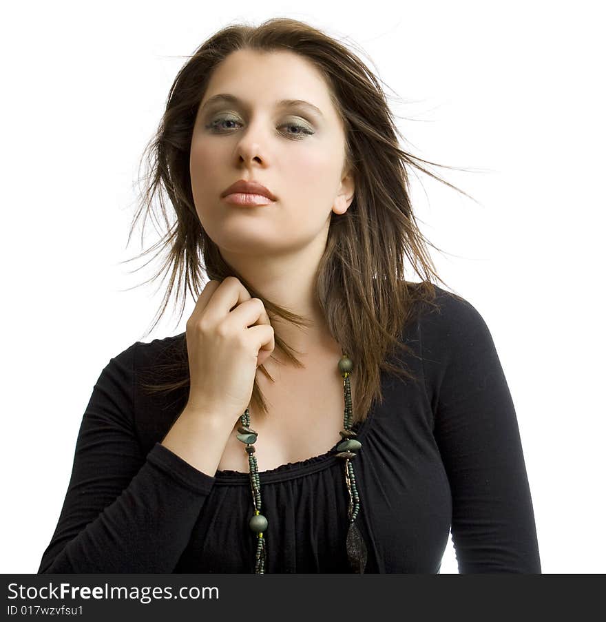 Portrait of an attractive  girl in black on white background. Portrait of an attractive  girl in black on white background