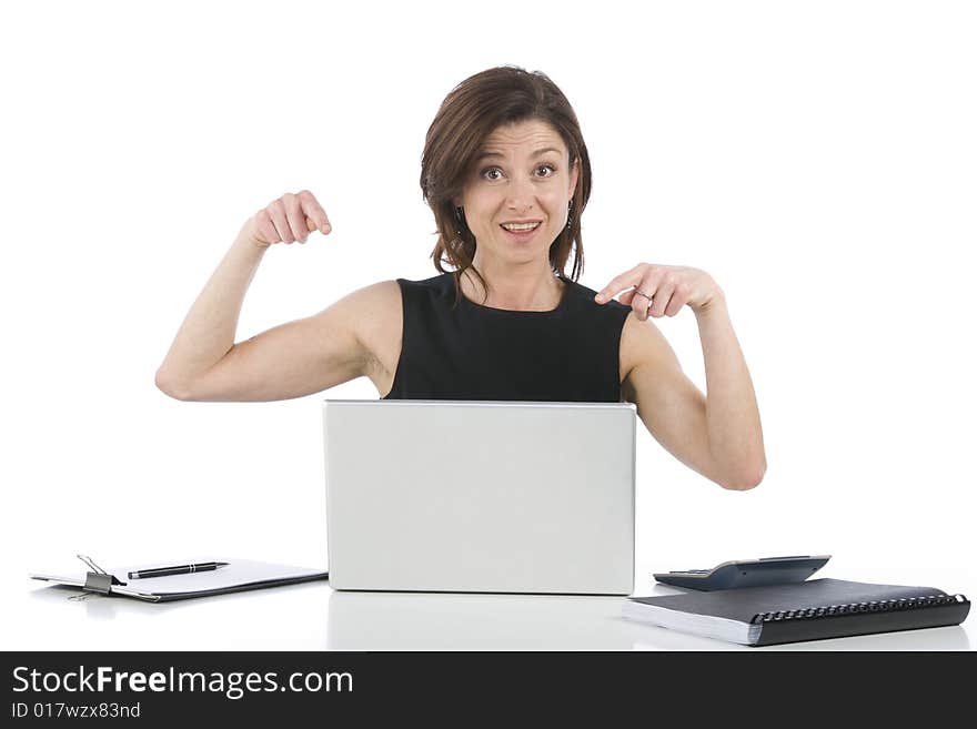 Beautiful businesswoman in her office indicating something on pc